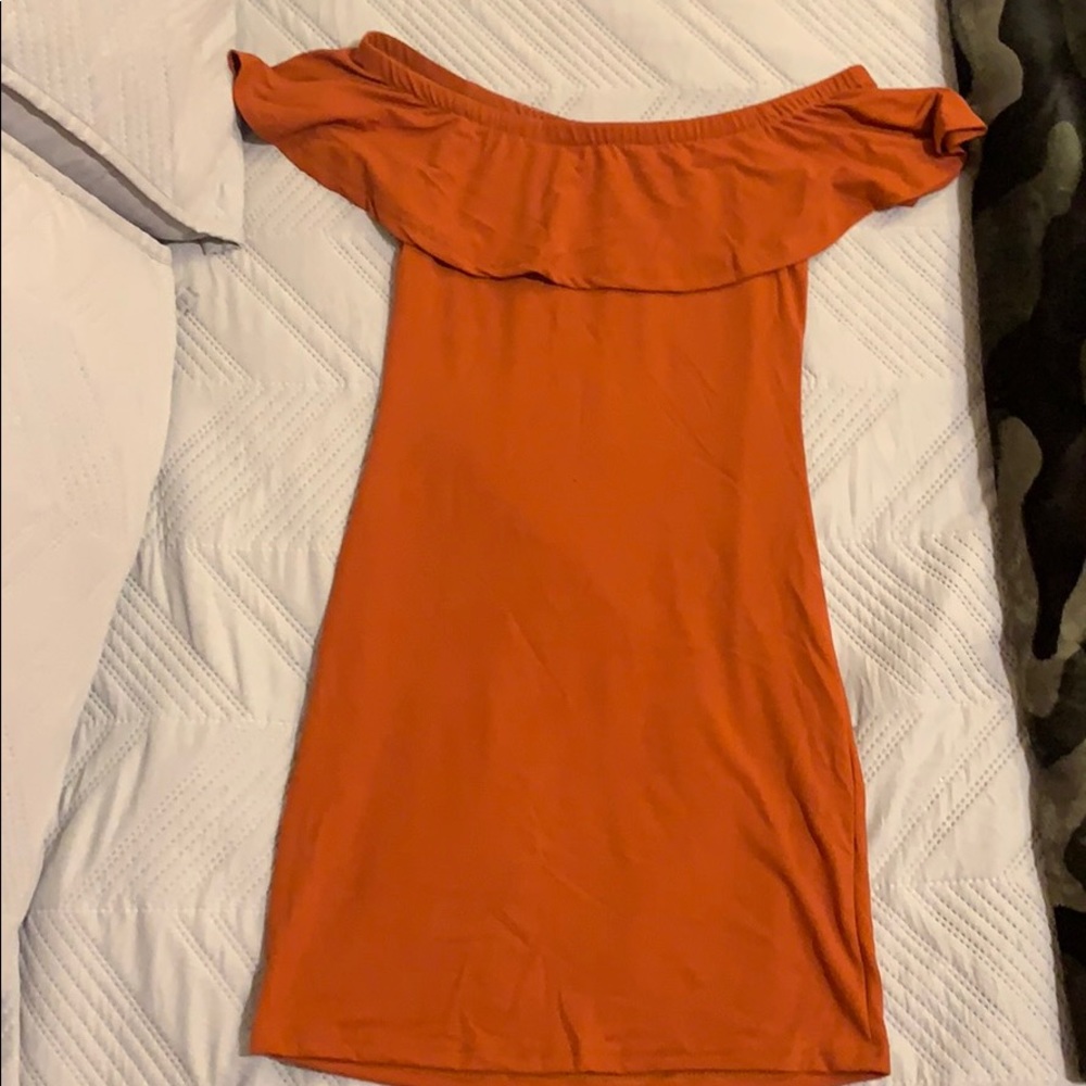 Off the shoulder dress.